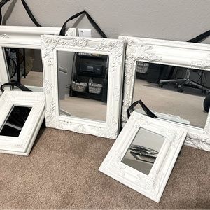 5 wooden mirrors. Great to hangup on an empty together or separately.